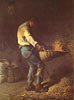 Mann beim Getreidesieben